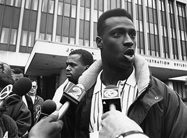 Student in the 1960s is interviewed by media regarding protest at MSU